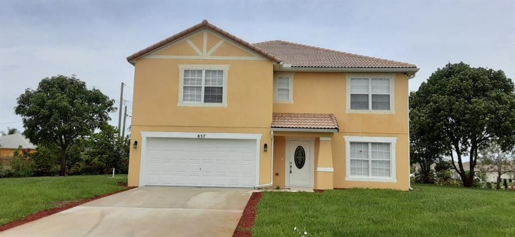 Photo of 857 SW Squirrel Avenue, Port Saint Lucie, FL 34953 (MLS # R10728507)