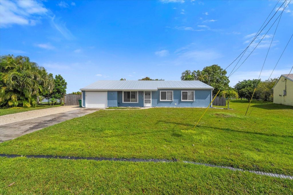 Photo of 2313 SE Pinero Road, Port Saint Lucie, FL 34952 (MLS # R10968283)