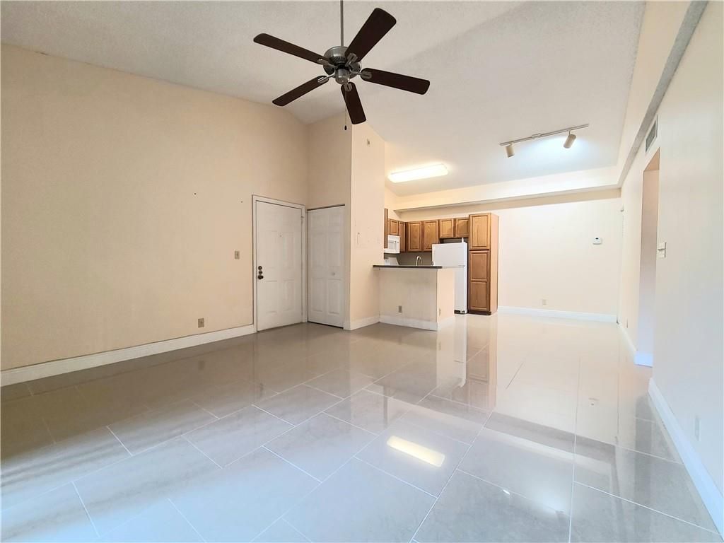 Photo of 641 Lyons Rd #11-203, Coconut Creek, FL 33063 (MLS # F10330818)