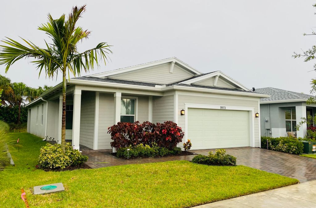 Photo of 11973 SW Lyra Drive, Port Saint Lucie, FL 34987 (MLS # R10806586)