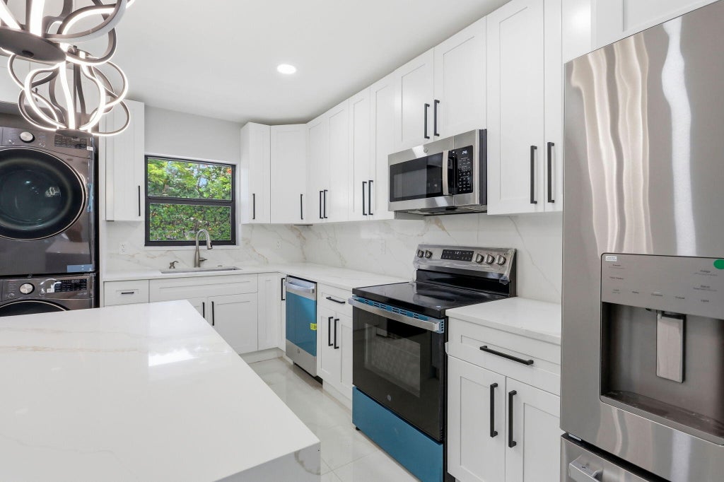 Photo of 2975 NE 2ND Avenue, Boca Raton, FL 33431 (MLS # B26077494)