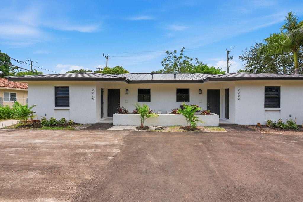 Photo of 2975 NE 2ND Avenue, Boca Raton, FL 33431 (MLS # B26077494)