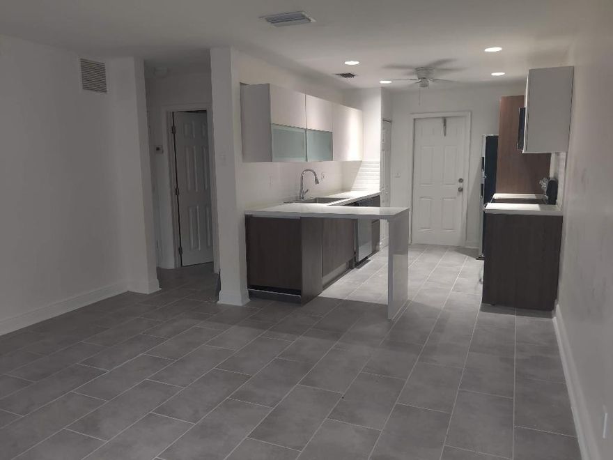 Beautifully remodeled unit on the second floor on Flagler Drive. 2 + 1 with dishwasher in the unit.