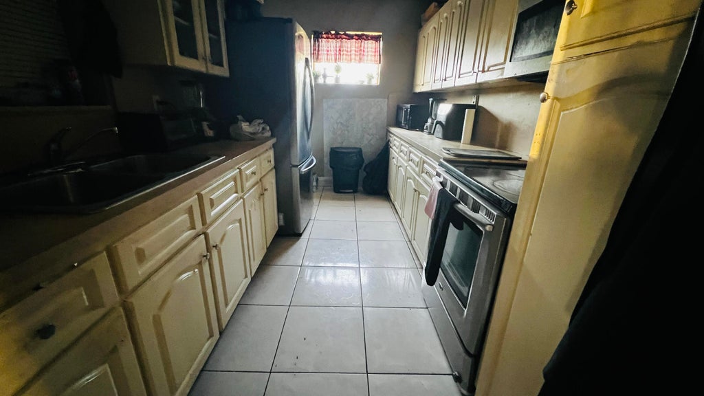 Photo of 1270 NW 54TH Avenue, Lauderhill, FL 33313 (MLS # B26057635)
