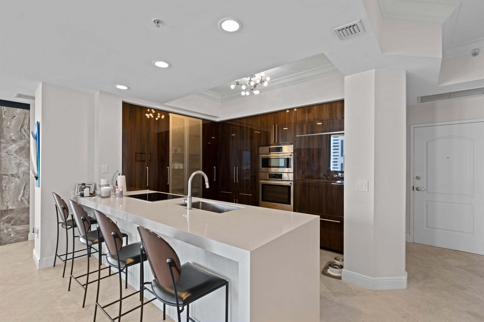 This amazing, completely renovated with High end finishes throughout, 3 bedroom, 3 bath on a High floor that offers a direct view of the Atlantic Ocean and the Intracoastal Waterway. Two parking spaces, High End Appliances, Smart toilet, Electric Blind's and so much more, a must see property!Building amenities include a roof top pool, steam & sauna rooms, 7th floor Lanai deck, state-of-the-art fitness center and club room; 24-hour manned front desk and security and Valet Parking. 2 side-by-side parking spaces (377 & 378) and storage locker