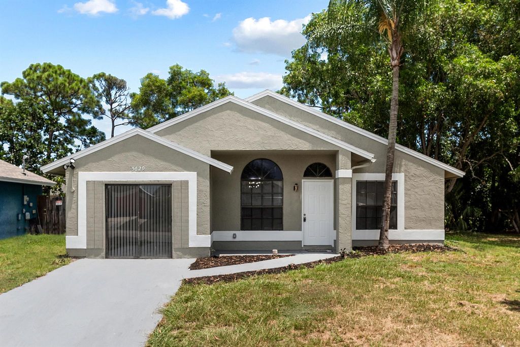 Photo of 5629 SE Collins Avenue, Stuart, FL 34997 (MLS # R11113259)