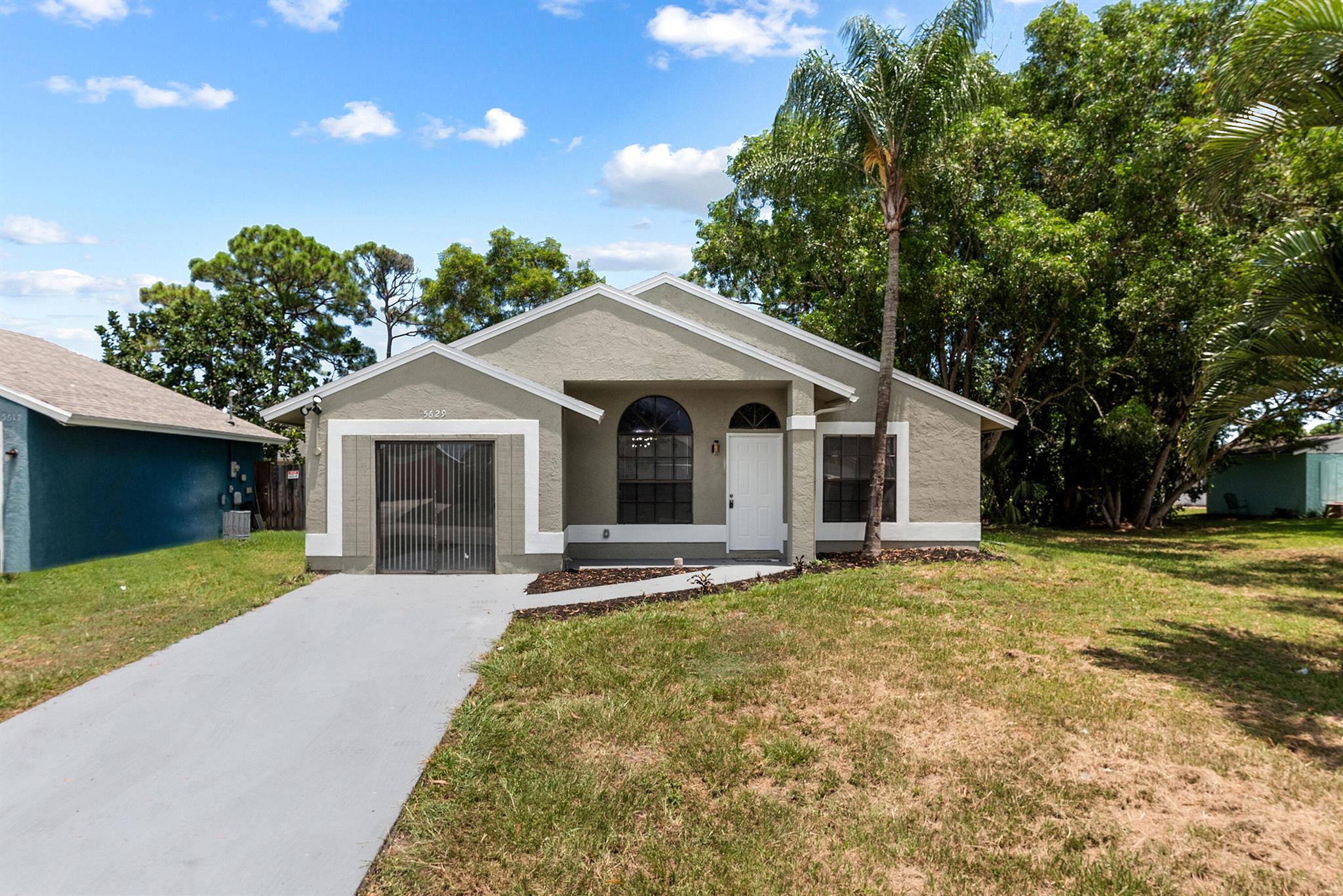 Welcome to this beautifully updated 3-bedroom, 2-bathroom home featuring a brand new roof (2025) and brand new vinyl flooring throughout. Enjoy the comfort of an AC unit that was serviced in 2019, ensuring efficiency and reliability. The kitchen and bathrooms have been tastefully updated, offering a fresh, modern feel.Major system upgrades include updated plumbing and electrical, providing peace of mind for years to come. The home also includes convenient washer and dryer hookups.Move-in ready and perfect for families, first-time buyers, or investors -- don't miss this turnkey opportunity!