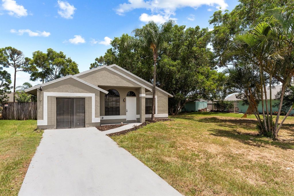 Photo of 5629 SE Collins Avenue, Stuart, FL 34997 (MLS # R11113259)