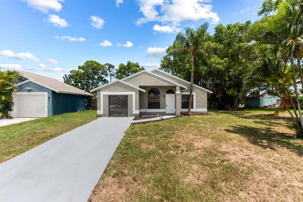 Photo of 5629 SE Collins Avenue, Stuart, FL 34997 (MLS # R11113259)