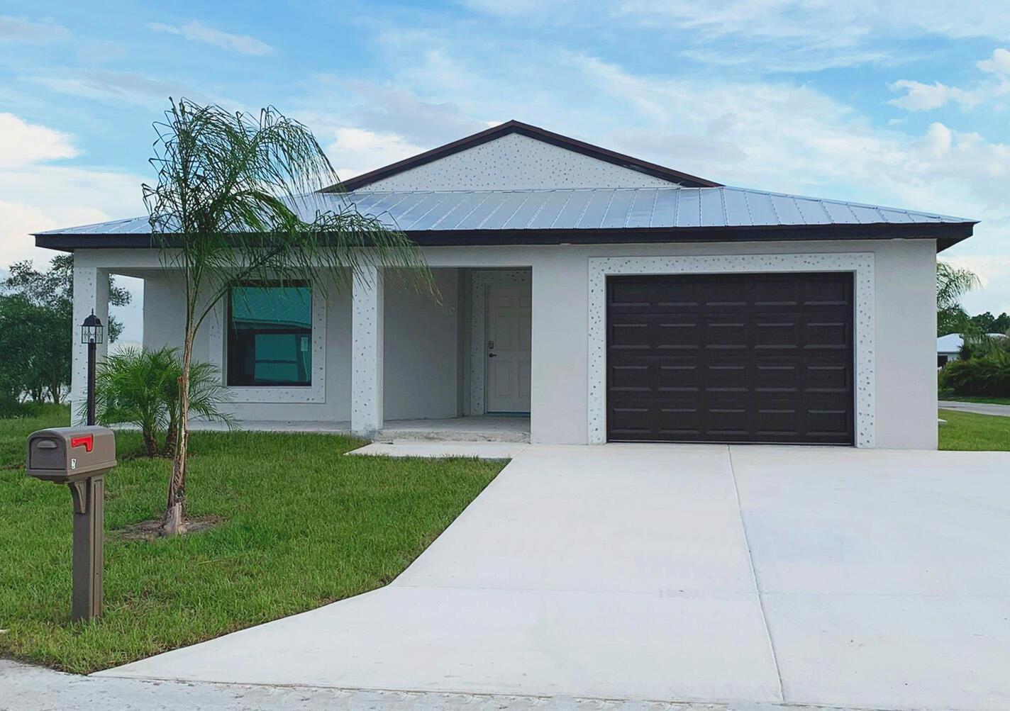 Our newest Model: The Platinum offers incredible value with 2 full bedrooms plus a den, 2 baths, and a 1 car garage. Enjoy high vaulted ceilings, a chef's kitchen with a versatile peninsula, Quartz countertops, open concept and large front and rear porch. Built for comfort and peace of mind with solid block construction and impact windows. All models offer additional value and security with 5/8'' true plywood roof sheathing, hurricane tie straps, R-30 insulation, & hip roof designs ensuring big insurance premium discounts plus all our homes are equipped with all energy efficient appliances. Land Lease is $549/mo. and locked in for 99 years. It includes all amenities, trash service & basic lawn maintenance.