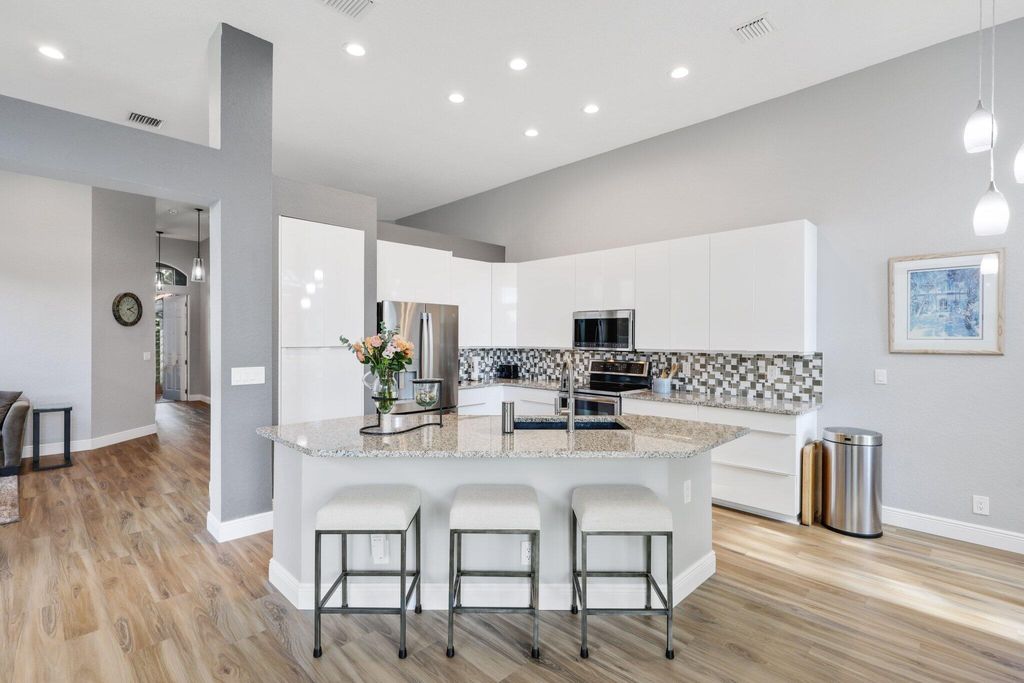 Photo of 5332 Grande Palm Circle, Delray Beach, FL 33484 (MLS # R11058521)