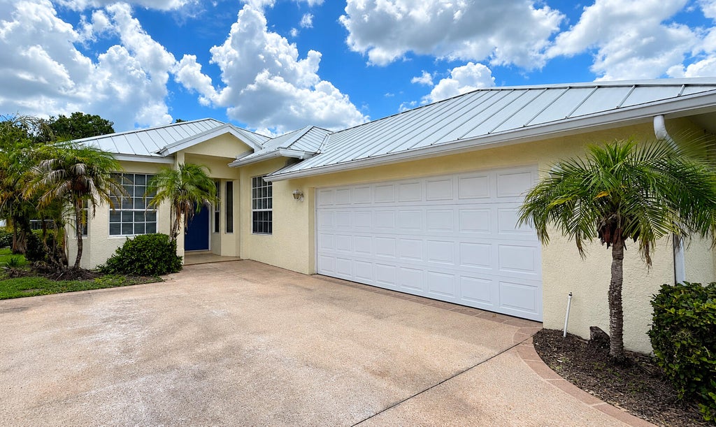 Photo of 9437 POINCIANA Court, Fort Pierce, FL 34951 (MLS # B26073705)