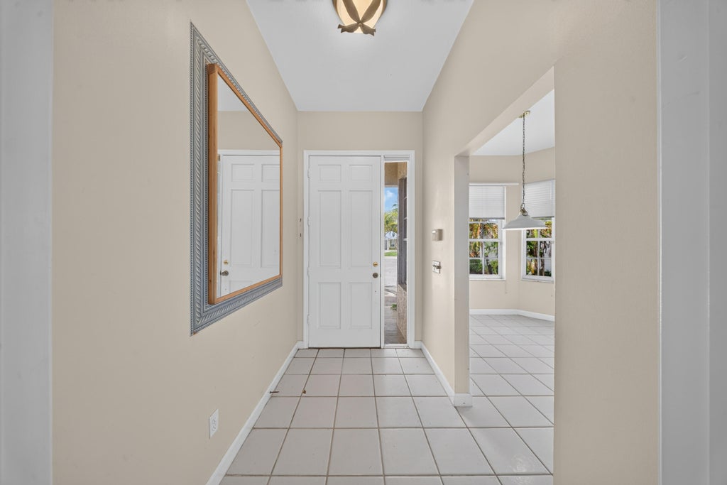 Photo of 9437 POINCIANA Court, Fort Pierce, FL 34951 (MLS # B26073705)