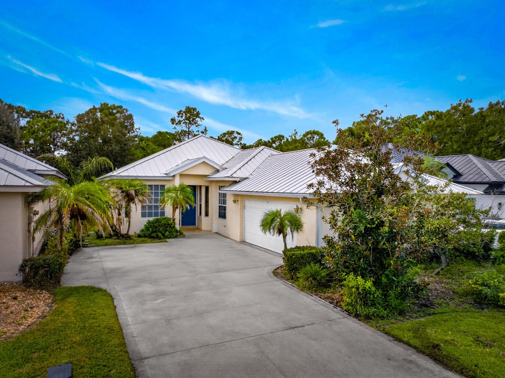 Photo of 9437 POINCIANA Court, Fort Pierce, FL 34951 (MLS # B26073705)