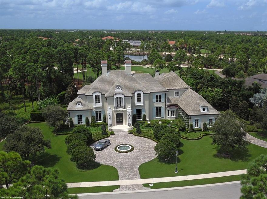 Outstanding five bedroom two story residence situated on an acre of property. All major rooms have expansive views of the golf course. This country French style estate has stunning details, throughout ,wide oak and limestone floors, crown moldings, smart technology, gourmet open kitchen with Carrera marble and onyx surfaces. Wonderful informal family room with vaulted ceilings that lead out to the outdoor living area, complete with summer kitchen. Adjoining is a privately located one bedroom guest house. The main level includes a formal living room with fireplace, a spacious dining room, handsome wood paneled office library, den and spacious guest bedroom with bath ensuite.