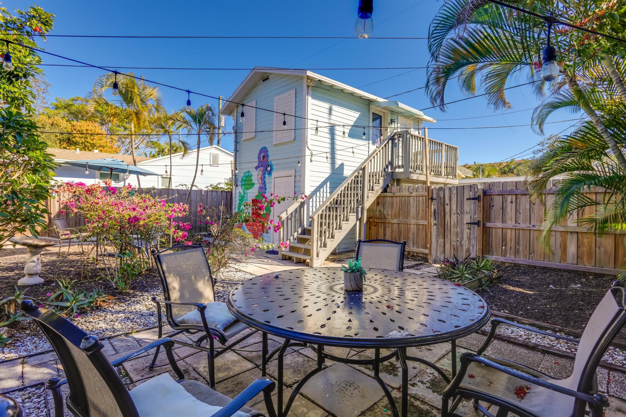 Tranquil second floor, private and cozy apartment located in the heart of Lake Worth Beach--no HOA! This light-filled unit is filled with charm; and features a private balcony, updated flooring and bathroom, with updated kitchen cabinets, backsplash and counters. Available furnished or partially-unfurnished. Nestled in a quiet neighborhood, this serene retreat is ideal for unwinding! Enjoy a lush shared backyard with string lights, seating, grill and abundant greenery. Pet-friendly with an abundance of street parking. Just minutes to the beach, i-95, downtown, shopping, dining and more. Water, electricity, pest control and basic internet, ALL Included in the Rent!