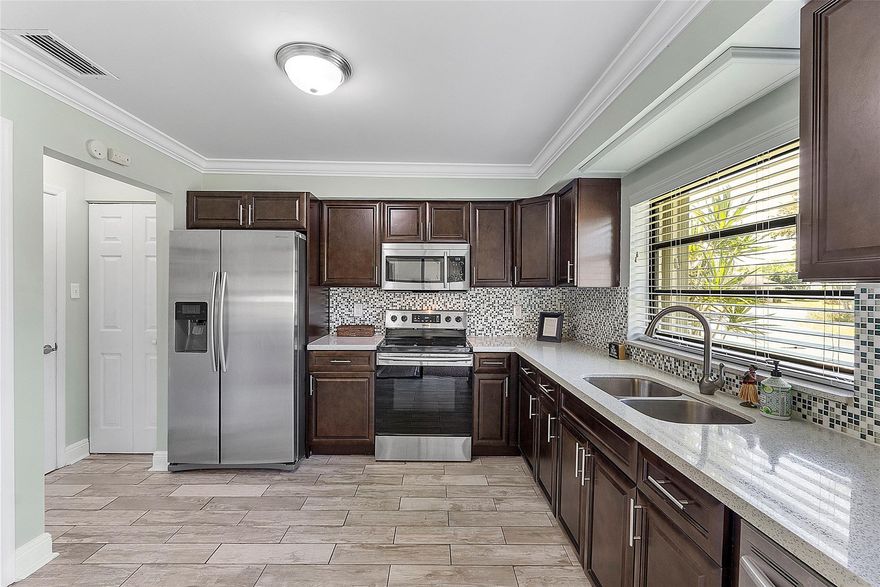 WELCOME HOME! PRICE IMPROVEMENT TO SELL NOW! BEST VALUE ON MARKET IN GREENTREE This beautiful villa is tucked away on a quiet street just steps to the pool and no loud street traffic Home has been updated and is light, bright and airy. Some features include, granite kitchen, updated baths with step in showers for both, several high end custom blinds on remote, cozy screened porch, hurricane shutters, crown molding and much more! Home being sold furnished w/ all decor and meticulously maintained. Call today for your private showing!