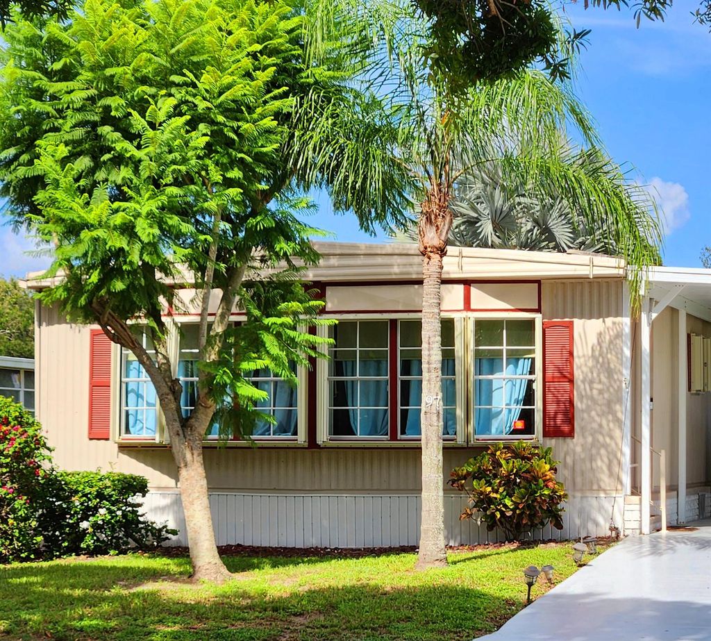 Photo of 97 W Caribbean, Port Saint Lucie, FL 34952 (MLS # R11005864)