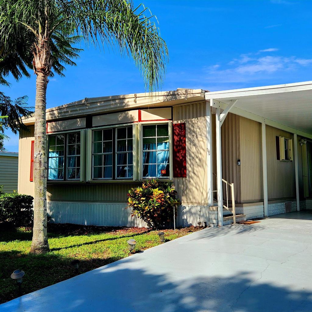 Photo of 97 W Caribbean, Port Saint Lucie, FL 34952 (MLS # R11005864)