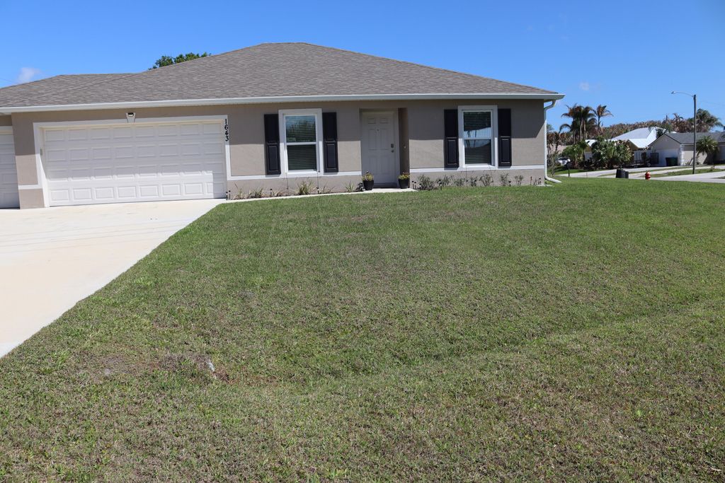 Photo of 1643 SE Ocean Lane, Port Saint Lucie, FL 34983 (MLS # B26005798)