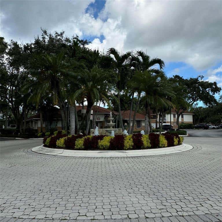 Photo of 712 NW 92nd Avenue, Plantation, FL 33324 (MLS # B26060244)