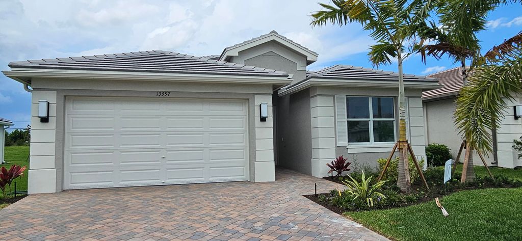 Photo of 13557 SW Oceanus Boulevard Blvd, Port St Lucie, FL 34987 (MLS # R10898302)
