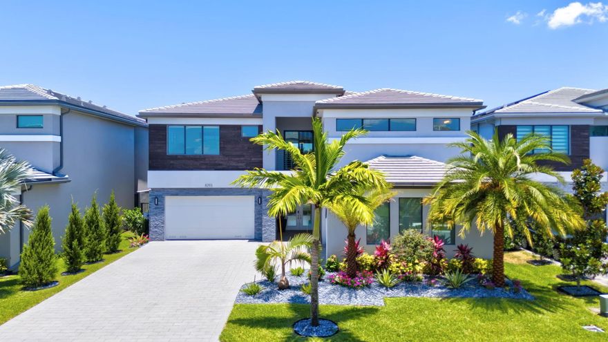 DISCOVER THIS STUNNING MALDIVES MODEL AT AN UNBEATEABLE PRICE! Set on an oversized lot, this 5,315 sq. ft. home offers complete privacy with panoramic water views, perfect for creating your own private oasis. Featuring the largest floor plan in the community, it boasts 5 ensuite bedrooms (including one on the main floor) and 2 half baths with premium contemporary finishes.The gourmet chef's kitchen is equipped with high-end appliances and an oversized island, ideal for entertaining. The elegant main floor includes a spacious family room, game room, den, and dining areas. An exquisite glass stair rail adds a touch of sophistication as you make your way upstairs, where you'll find a grand loft, media room, and a luxurious primary suite with a private balcony.