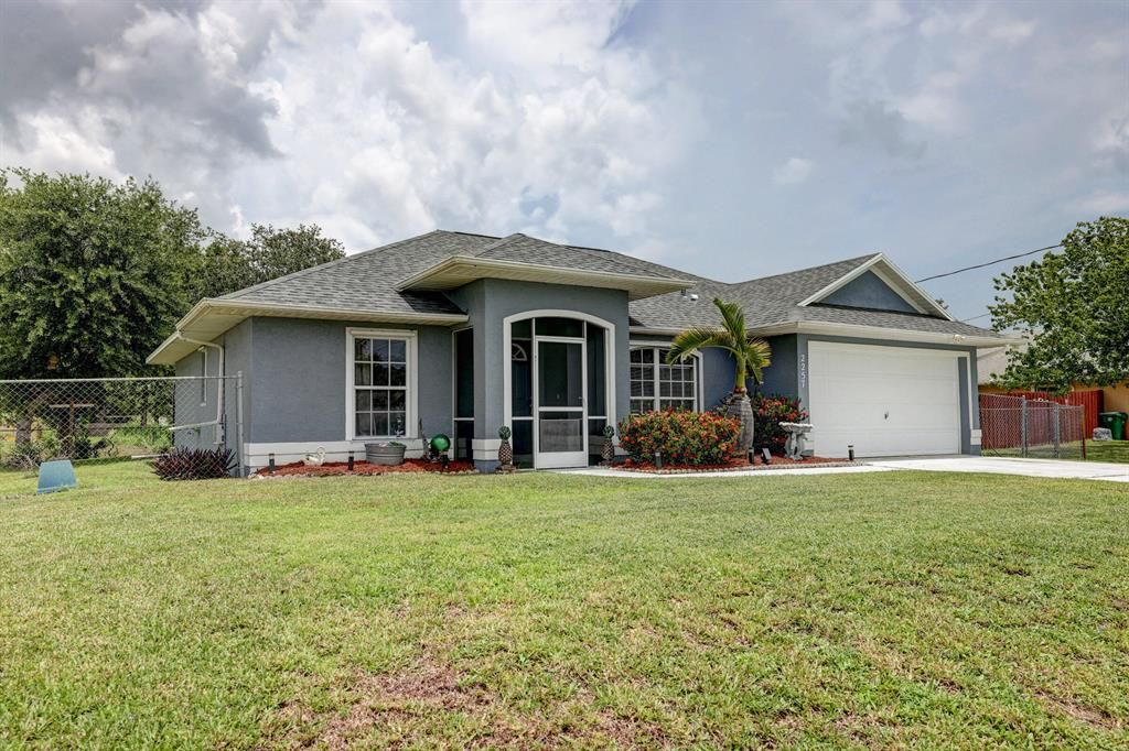 Photo of 2257 SW Gray Beal Avenue, Port Saint Lucie, FL 34953 (MLS # R10733110)
