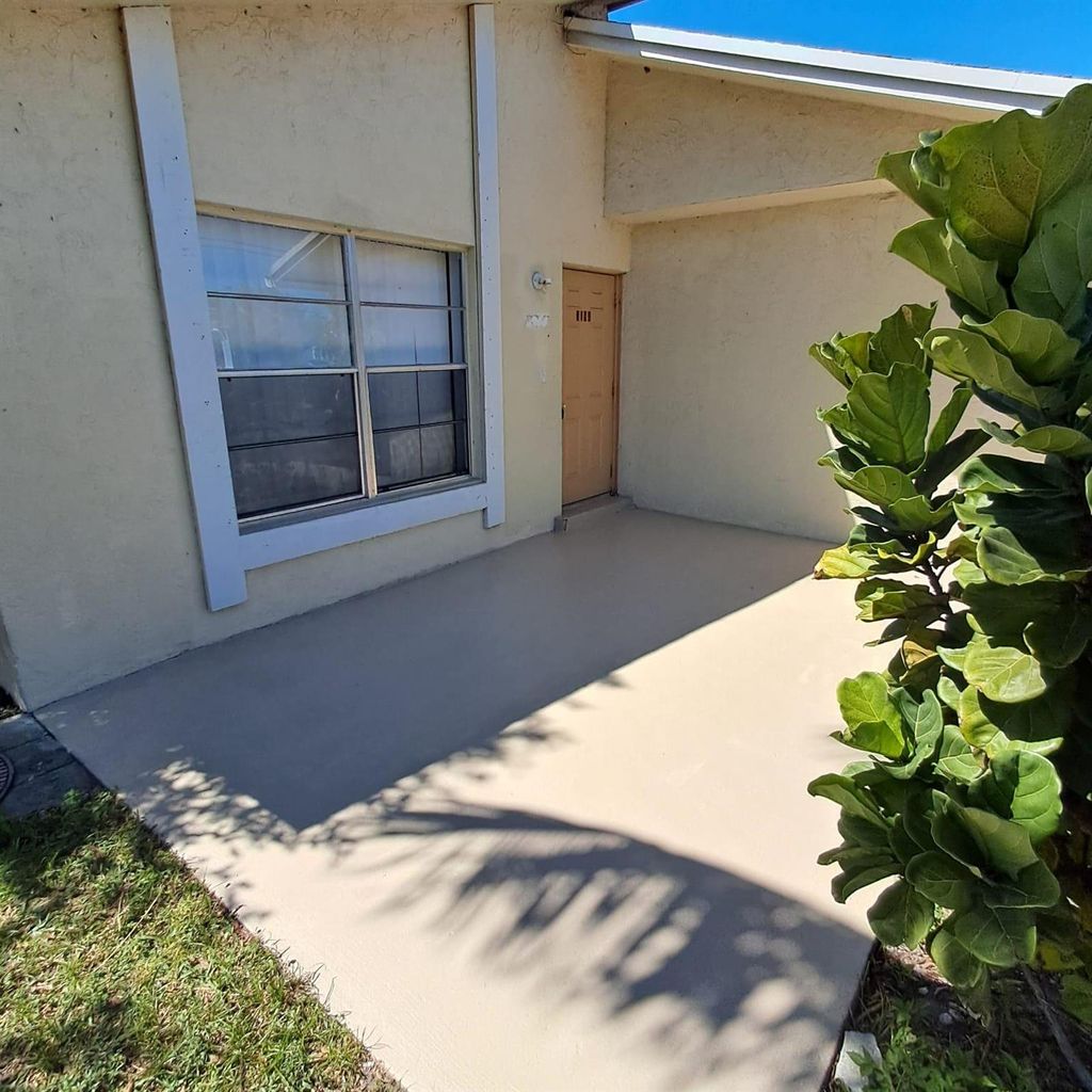 Photo of 3194 49th Lane, Lake Worth, FL 33461 (MLS # R11073200)