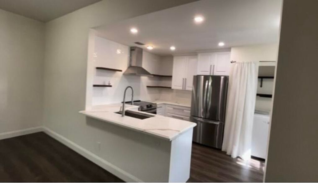 Photo of 12066 NW 11th Street, Pembroke Pines, FL 33026 (MLS # B26002960)