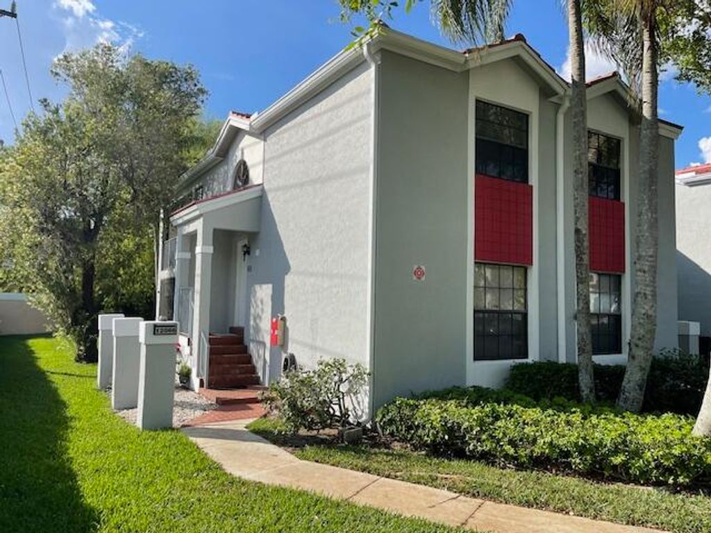 Photo of 12066 NW 11th Street, Pembroke Pines, FL 33026 (MLS # B26002960)