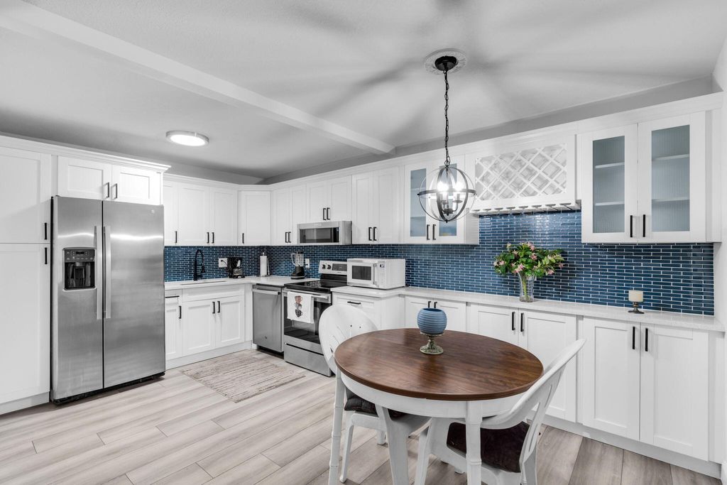 Photo of 312 Knotty Pine Circle #C-1, Greenacres, FL 33463 (MLS # R11133771)