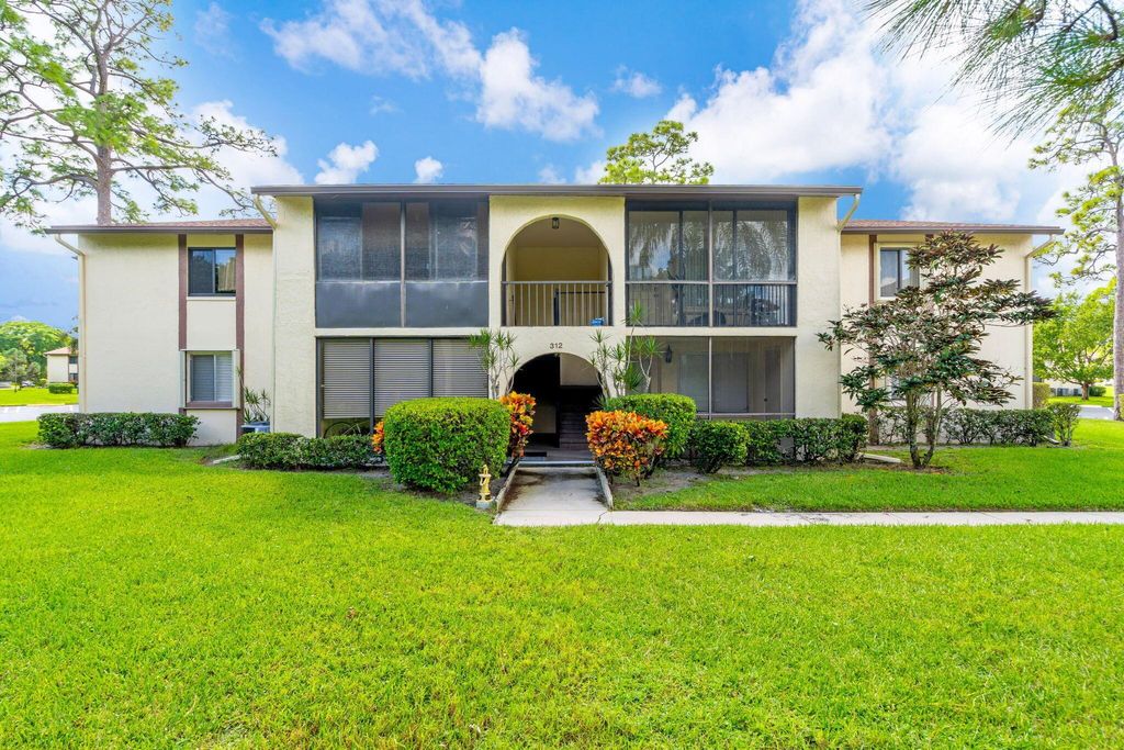 Photo of 312 Knotty Pine Circle #C-1, Greenacres, FL 33463 (MLS # R11133771)