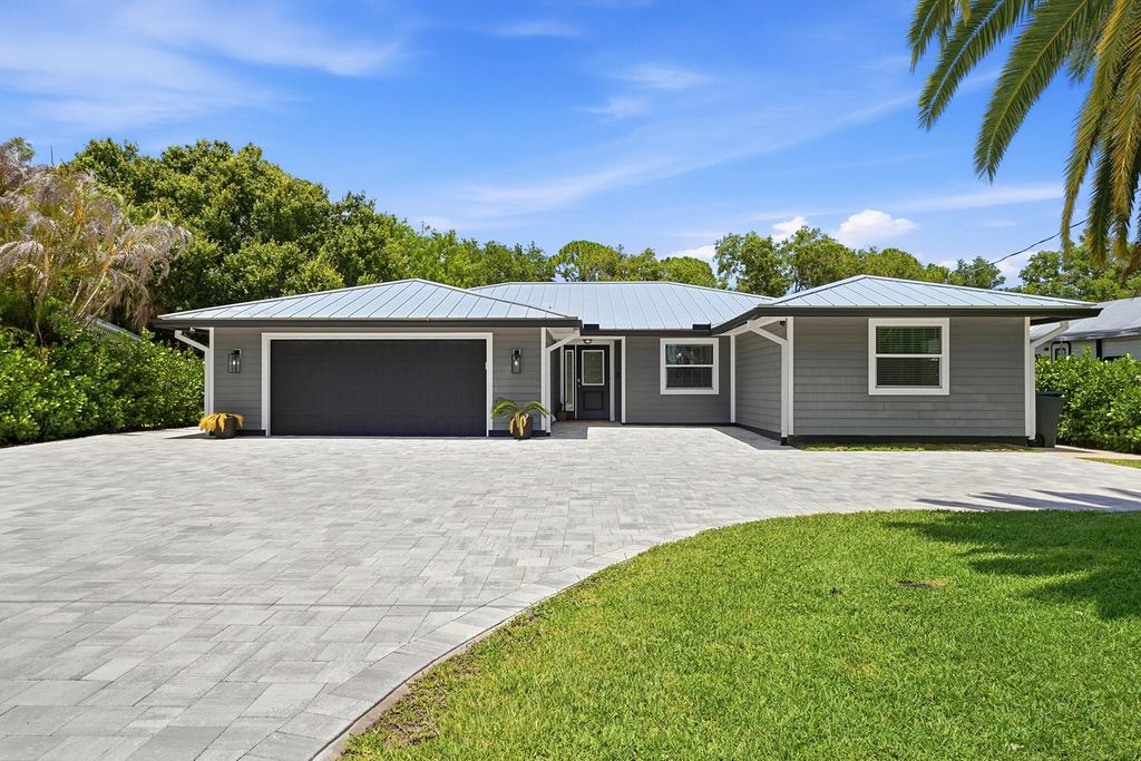 Photo of 1409 SW Ibis Street, Palm City, FL 34990 (MLS # B26038251)