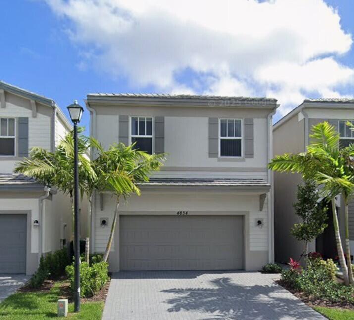Photo of 4834 NW 48th Terrace, Tamarac, FL 33319 (MLS # B26082079)