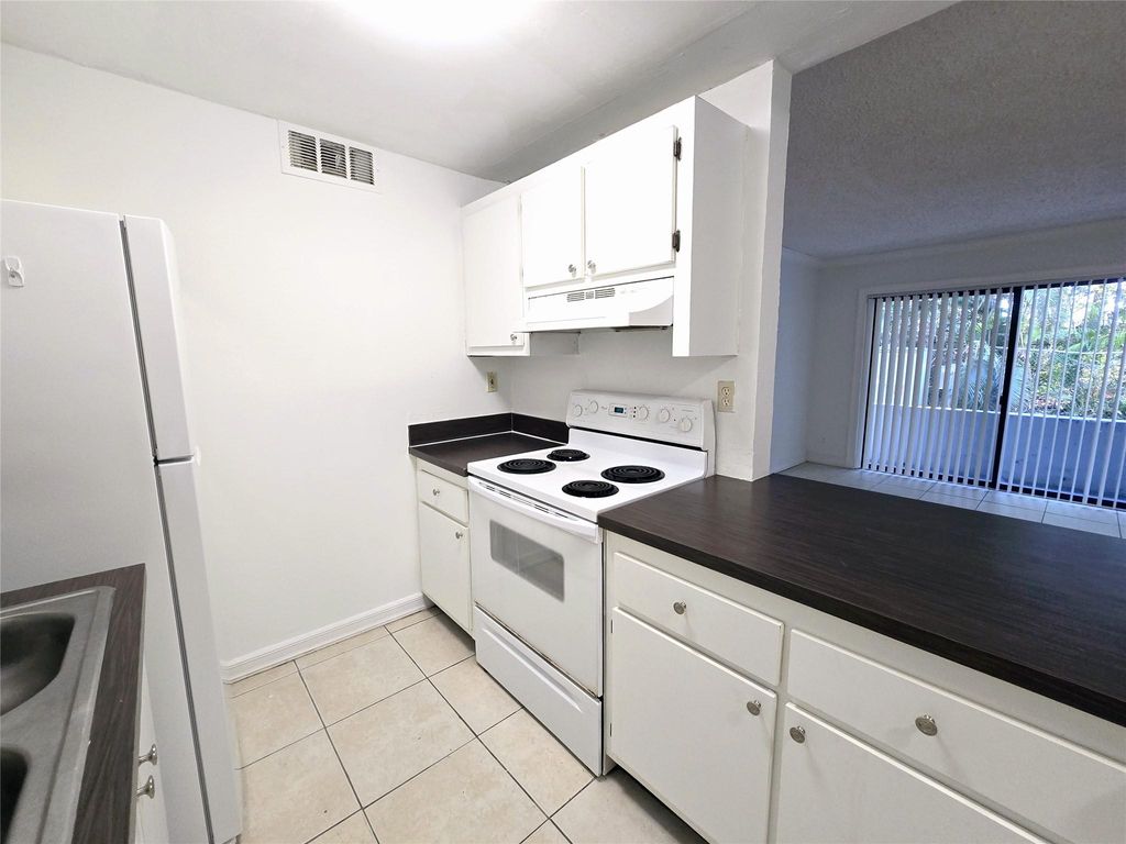 Photo of 1850 N Congress Avenue #106, West Palm Beach, FL 33401 (MLS # F10478616)