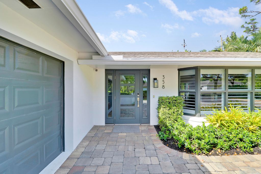 Photo of 358 Country Club Drive, Tequesta, FL 33469 (MLS # R11074440)