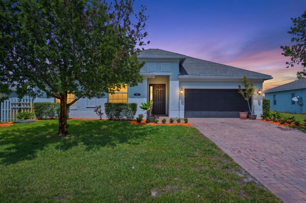 Photo of 691 SW Haas Avenue, Port Saint Lucie, FL 34953 (MLS # B26015583)