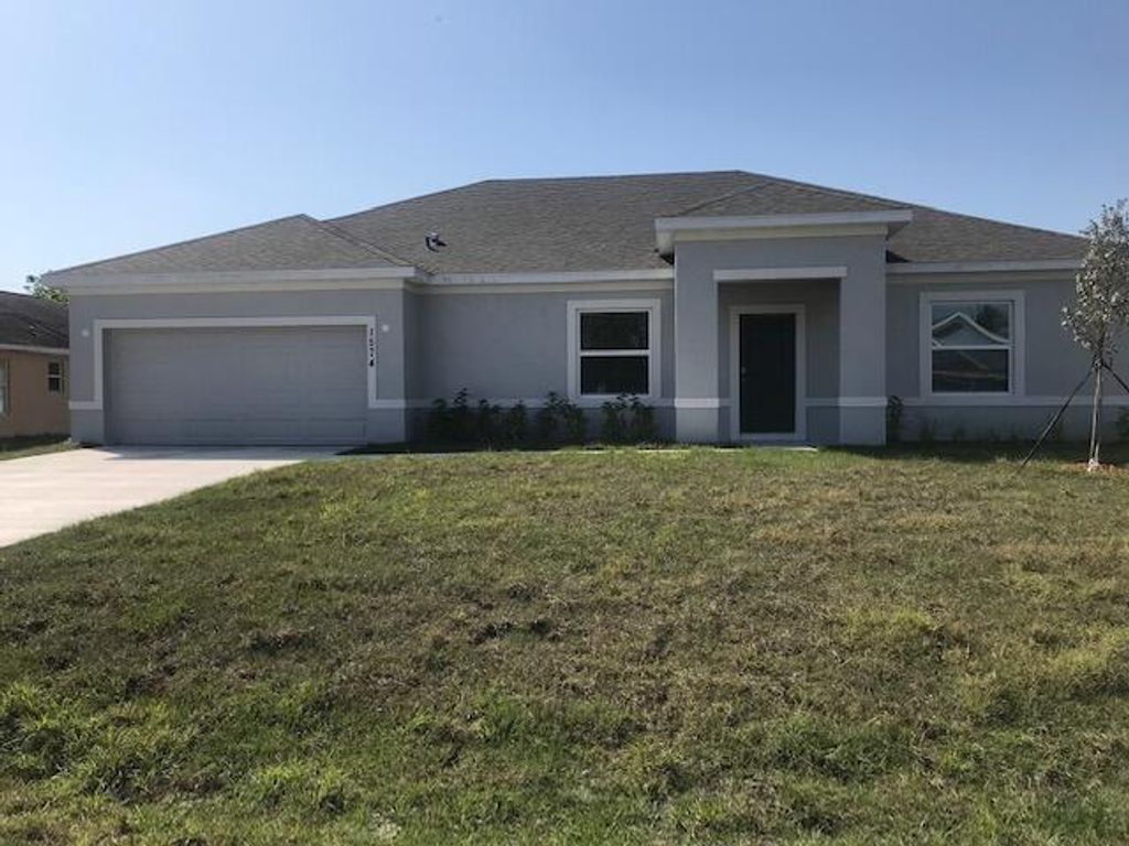 Photo of 1574 SW Flagami Road, Port St Lucie, FL 34953 (MLS # R10873373)