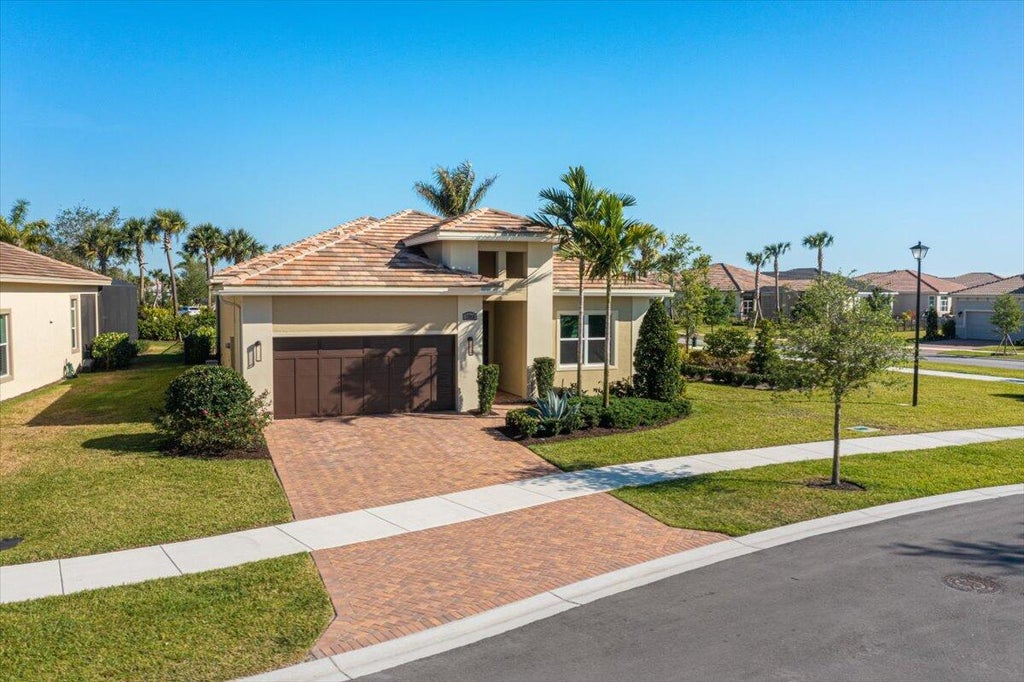 Photo of 12018 SW Vano Way, Port Saint Lucie, FL 34987 (MLS # R10978204)