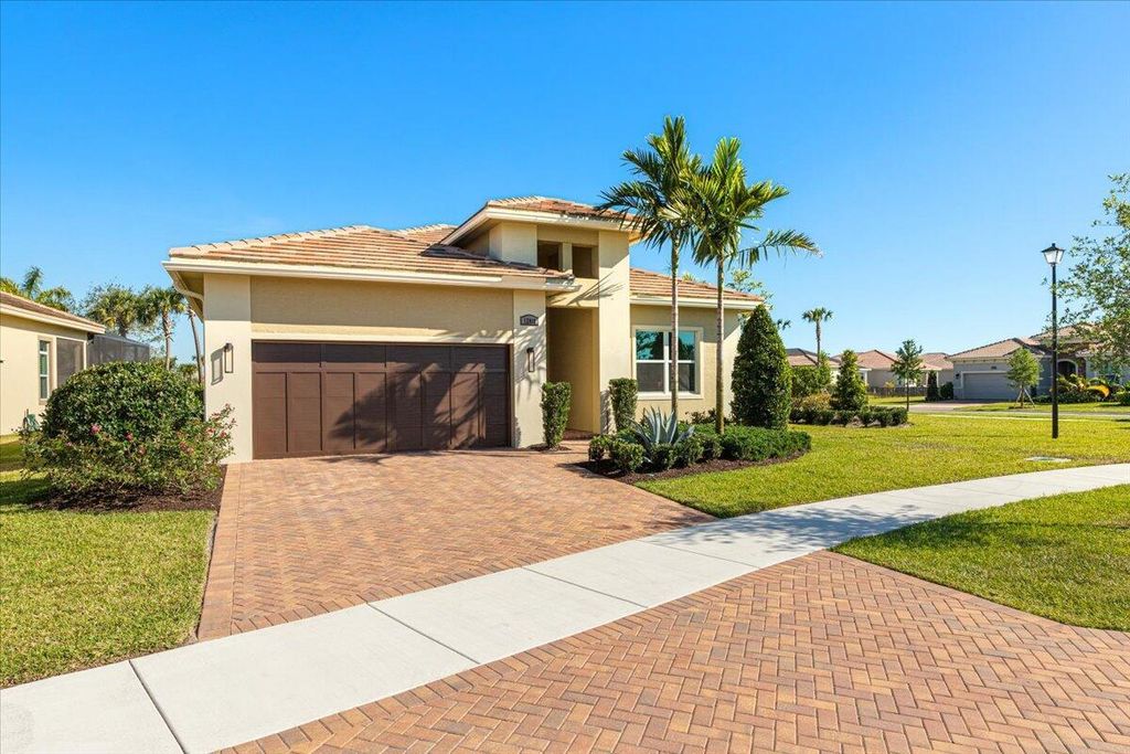 Photo of 12018 SW Vano Way, Port Saint Lucie, FL 34987 (MLS # R10978204)