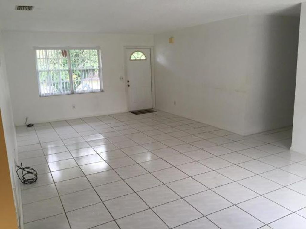 Photo of 2231 SE Braddock Street, Port Saint Lucie, FL 34952 (MLS # R11113400)