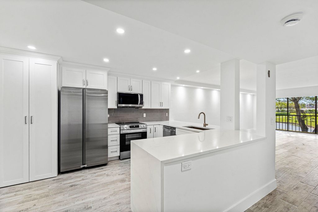 Photo of 7192 Huntington Lane #208, Delray Beach, FL 33446 (MLS # B26019562)