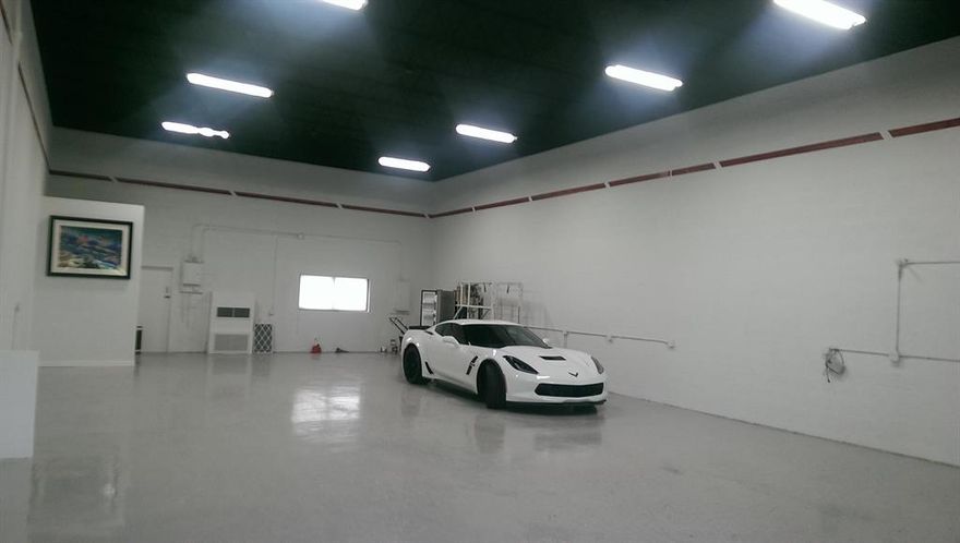 This Beautiful unit is 1 of only 3 in this freestanding Building in the Heart of Boca Raton. Newly renovated Open Space - approximately 30+ wide x 59+ long with 18 foot high [16' clear] ceilings. New epoxy floor, New Led Lighting, New Impact Windows, Newly remodeled rest room, New Powerlift 10'' x 12 high hurricane rated Overhead door, New 220 VAC 200 AMP electrical system - Fully Air Conditioned. This space is perfect for Antique Car display - artist/craft/hobby studio - or any clean manufacturing - showroom distribution usage. M2 Zone permits a wide variety of uses in the City of Boca Raton. Located in the middle of the City of Boca ;  3 PHASE POWER available at location.