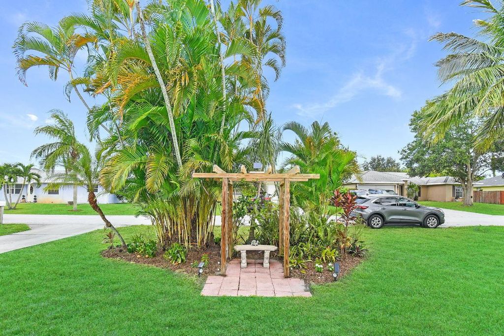 Photo of 1026 NW 16th Street, Stuart, FL 34994 (MLS # R11131572)