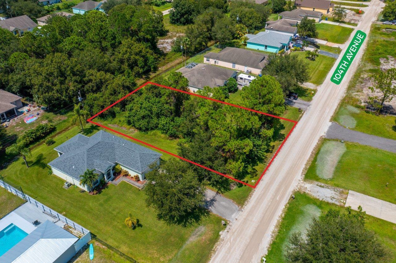 Discover the opportunity to build your dream home on this expansive lot in the highly sought-after Vero Lake Estates. Nestled on 104th Ave in Vero Beach, this parcel offers a serene setting with mature trees and is ideally positioned for those seeking a peaceful retreat while still being close to city conveniences. Vero Lake Estates is known for its friendly community, picturesque surroundings, and proximity to Vero Beach's array of shopping, dining, and recreational activities. Don't miss out on the chance to secure a slice of paradise in this prime location.
