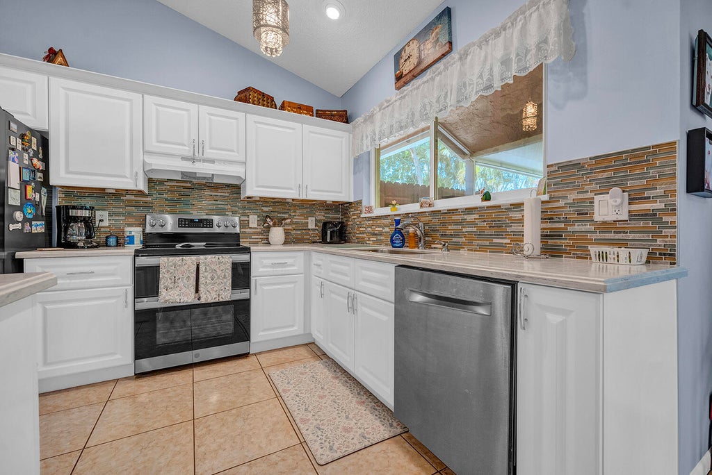 Photo of 8026 Marshwood Lane, Lake Worth, FL 33467 (MLS # B26086045)