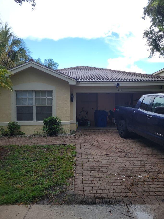 Photo of 638 PEPPERGRASS Run, Royal Palm Beach, FL 33411 (MLS # B26070545)