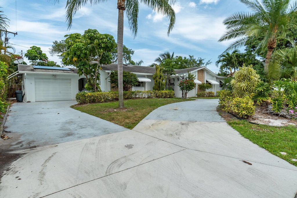 Photo of 317 Daly Road, Tequesta, FL 33469 (MLS # R10796555)
