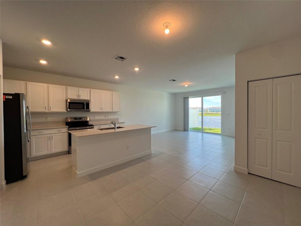 Photo of 655 SE Lake Falls Street, Port Saint Lucie, FL 34984 (MLS # F10537513)